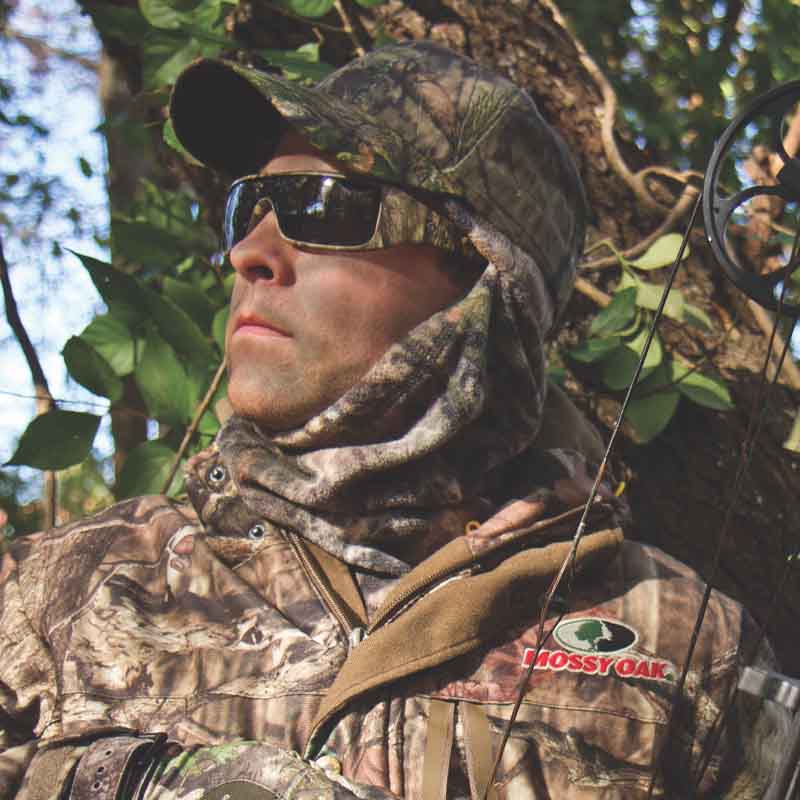 Mossy Oak and Popticals Sunglasses, Hunter wearing Popticals Mossy Oak Sunglasses