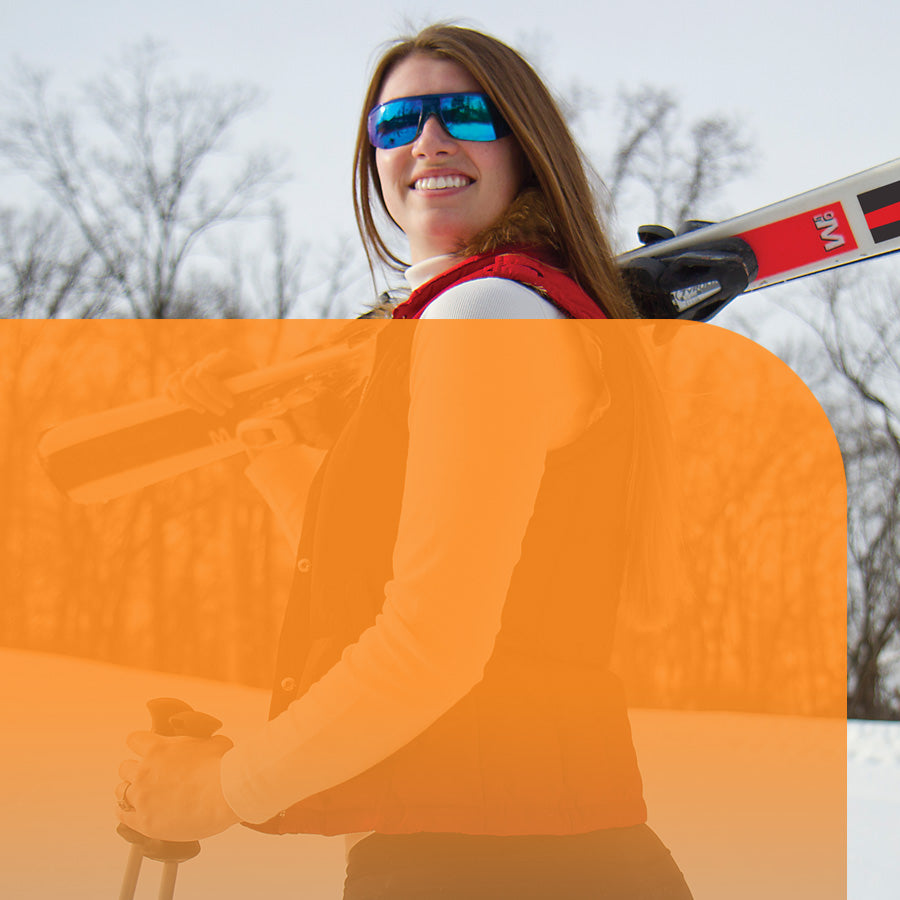 woman with treatment skiing wearing sunglasses