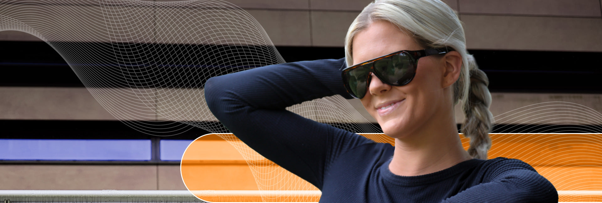 woman smiling wearing popticals everywhere sunglasses